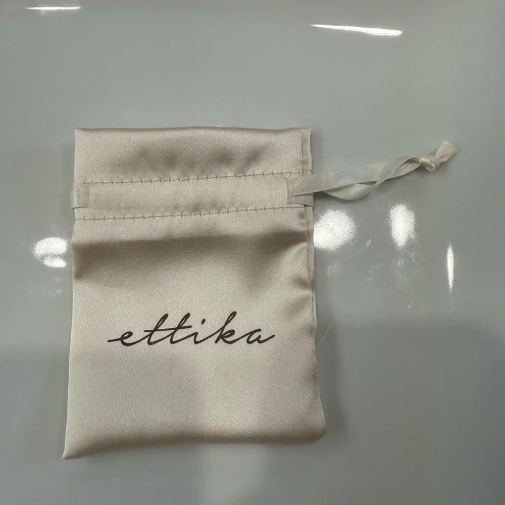 ettika like new